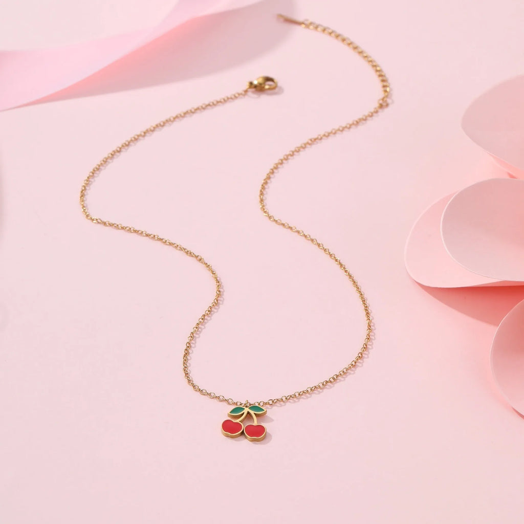 Complete cherry jewellery set with stainless steel necklace, bracelet, earrings, and ring featuring 18K electroplating