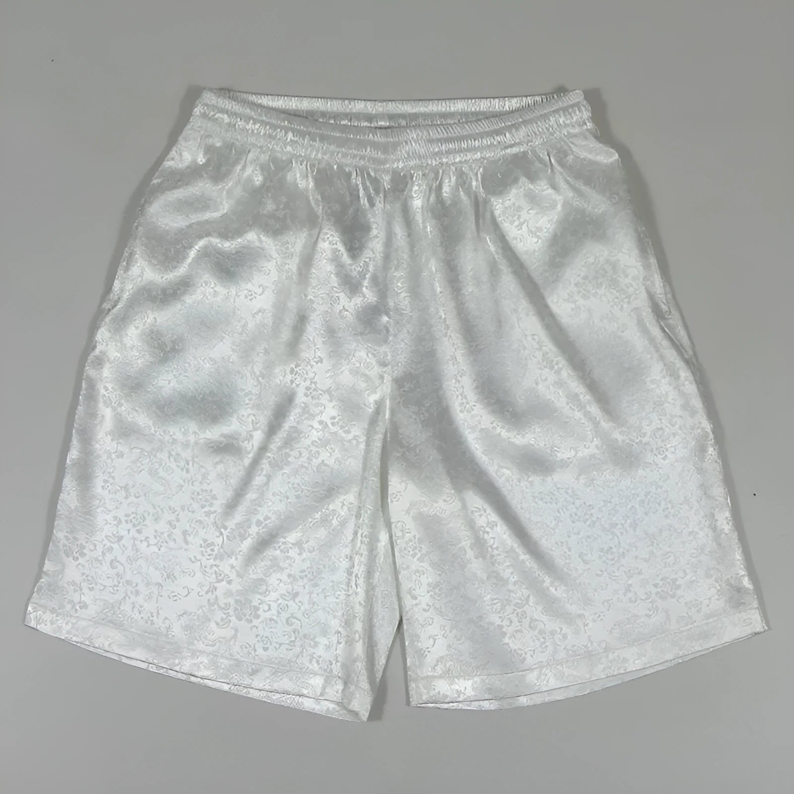 Men's black Tang suit style elastic shorts with a drawstring waist for martial arts.