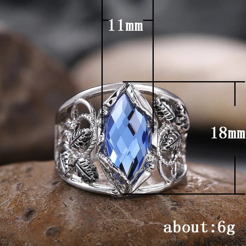 Women's alloy ring with horse eye-shaped blue crystal inlay in geometric style