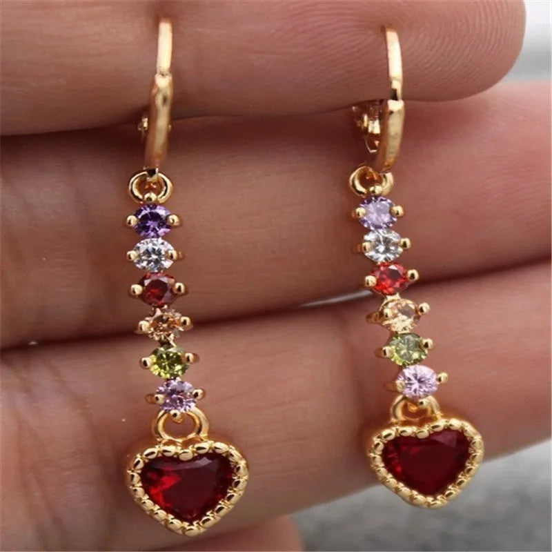 Pair of women's heart-shaped alloy earrings with electroplated gold or silver finish