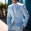 Men's blue British-style suit jacket with white buttons and straight hem design