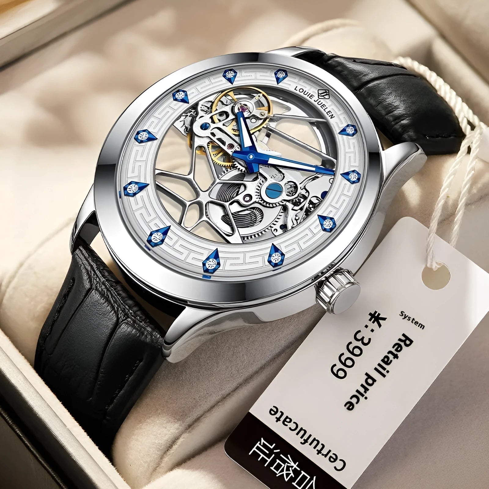Men's silver case mechanical watch with white dial, blue hands, black leather strap and waterproof construction