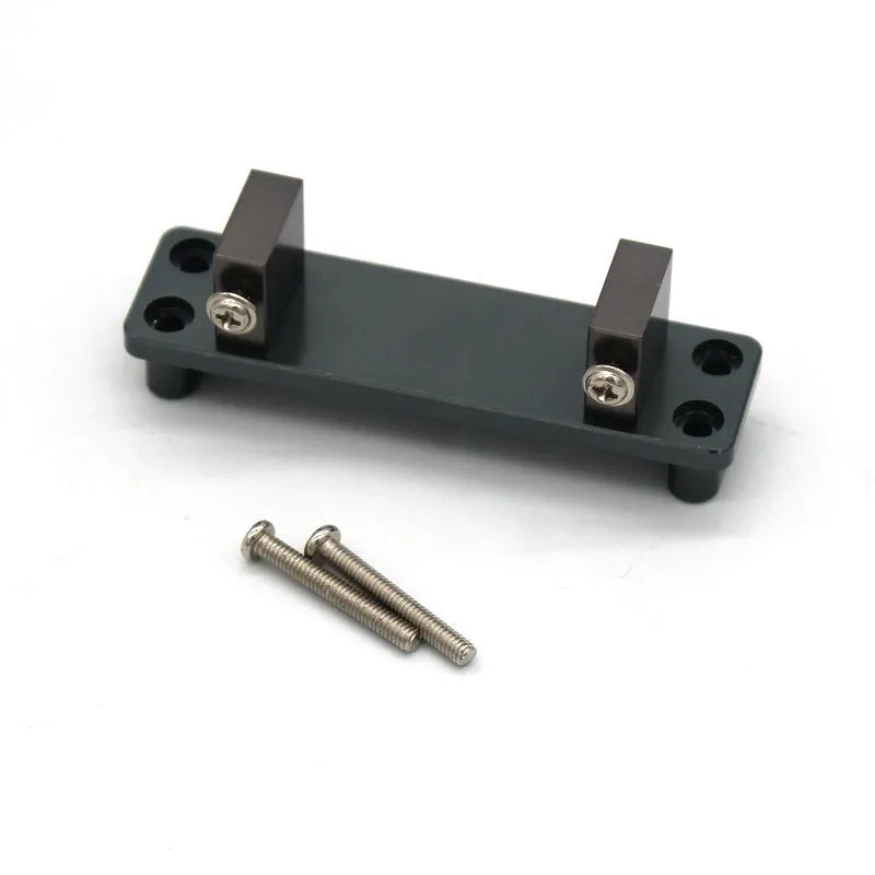 Grey alloy metal upgrade parts and black tyres for a 1/14 scale military remote control car model.