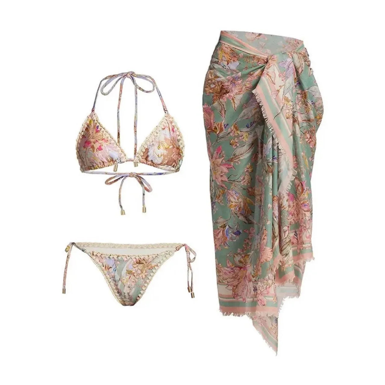 Creamy-white floral print women's three-piece bikini set with top, briefs, and skirt on a beach background.