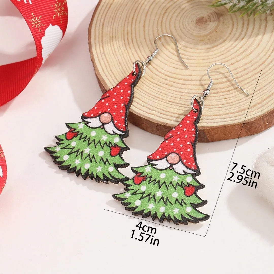 Women's wooden Christmas earrings showing Christmas tree and water drop snowman designs with Santa Claus elements