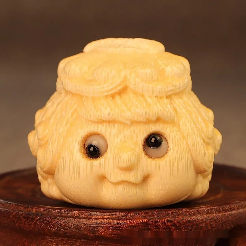 Solid bamboo carved golden Princess Toad ornament measuring 5.0cm, a cute style decorative figurine.