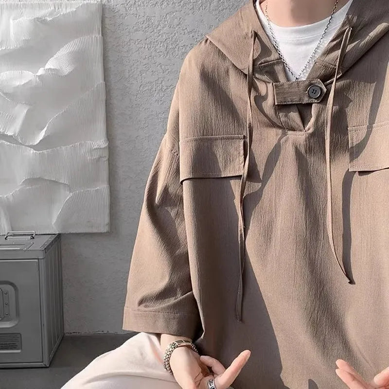 Men's loose fit hooded t-shirt in polyester with short sleeves available in multiple colours
