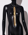 Metal sequins bow tie in arrow shape with electroplated finish in silver, gold, and black