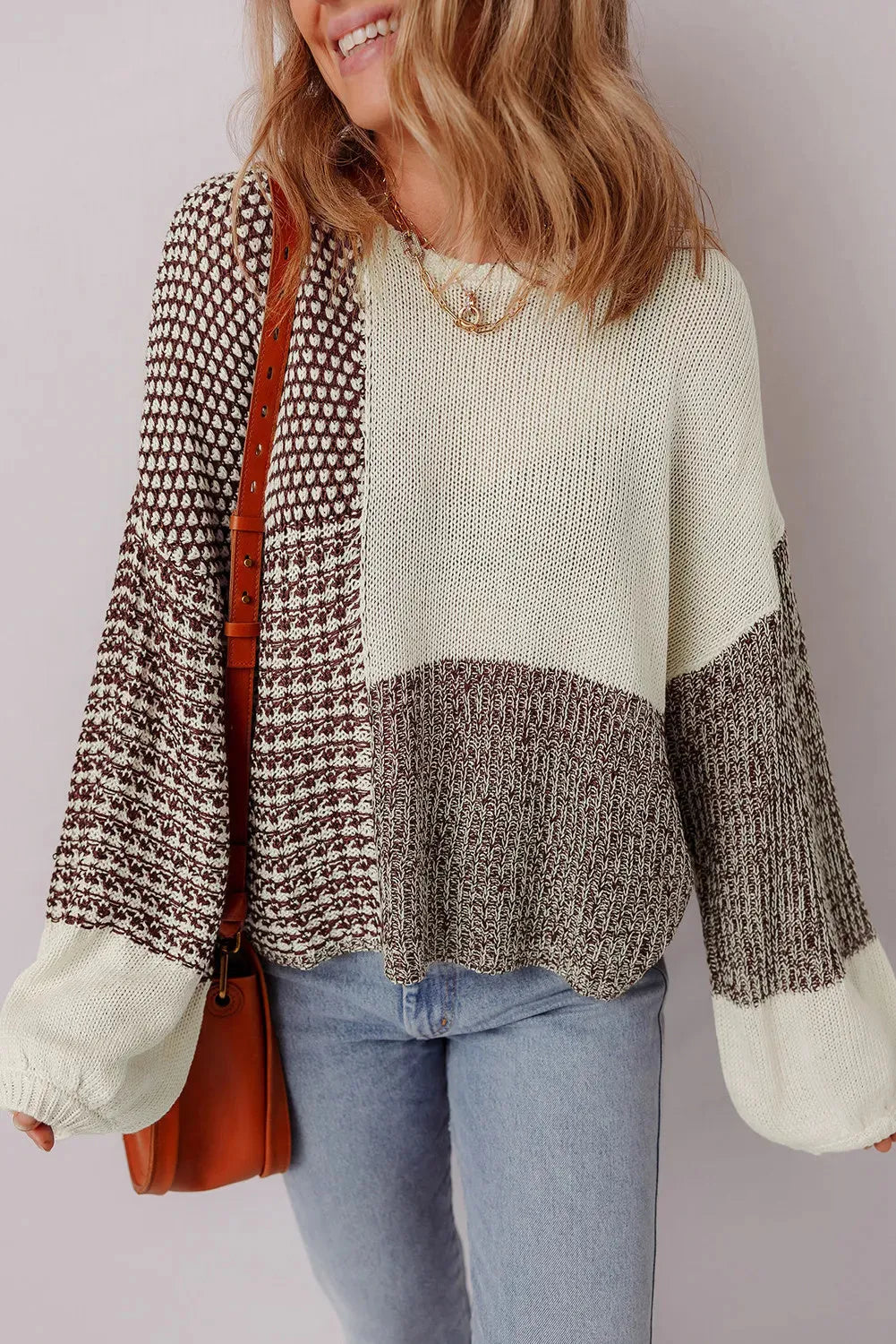 Dark khaki women's loose sweater with back tie closure and drop shoulders.