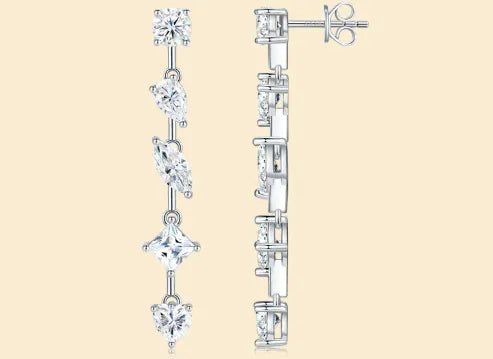 Pear-shaped moissanite drop earrings in 925 sterling silver with cold wind style on white background