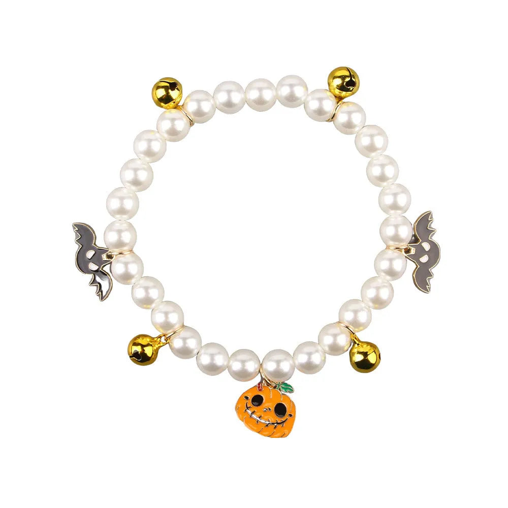 3 imitation pearl pet necklaces with small bells on adjustable cords for Halloween decoration