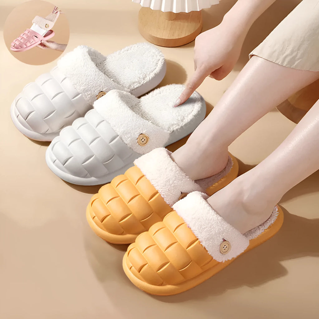Women's pink and grey plaid EVA slippers with a detachable upper and plush lining on a wooden floor.