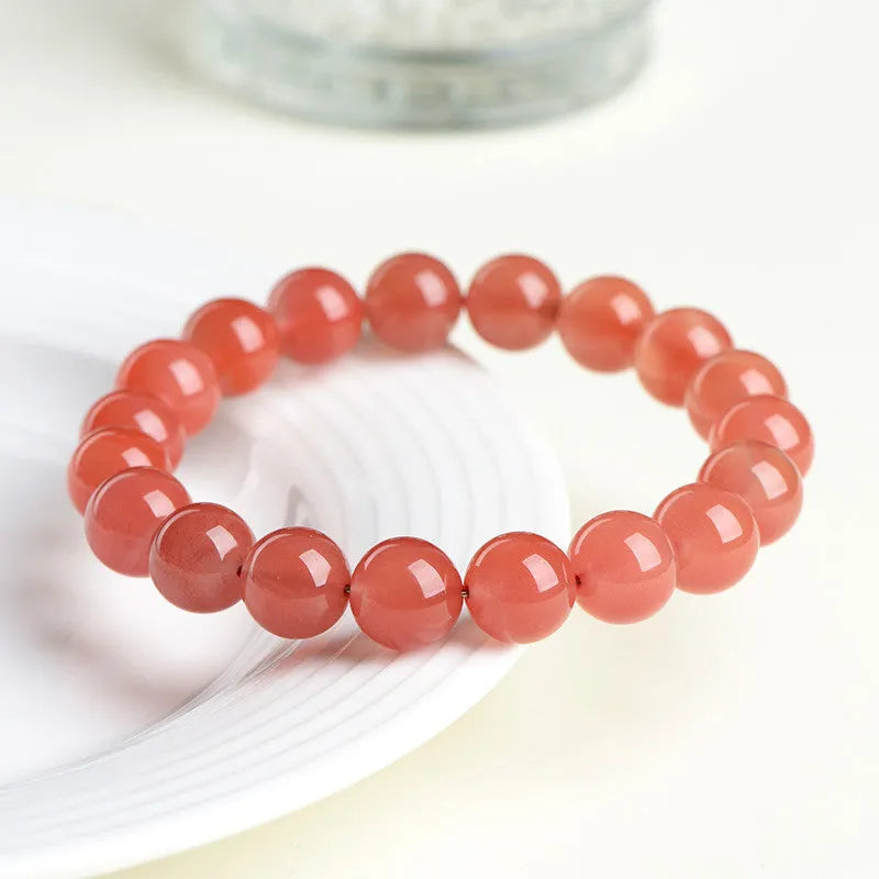 Natural South cherry red agate bracelet with polished beads in scattered design