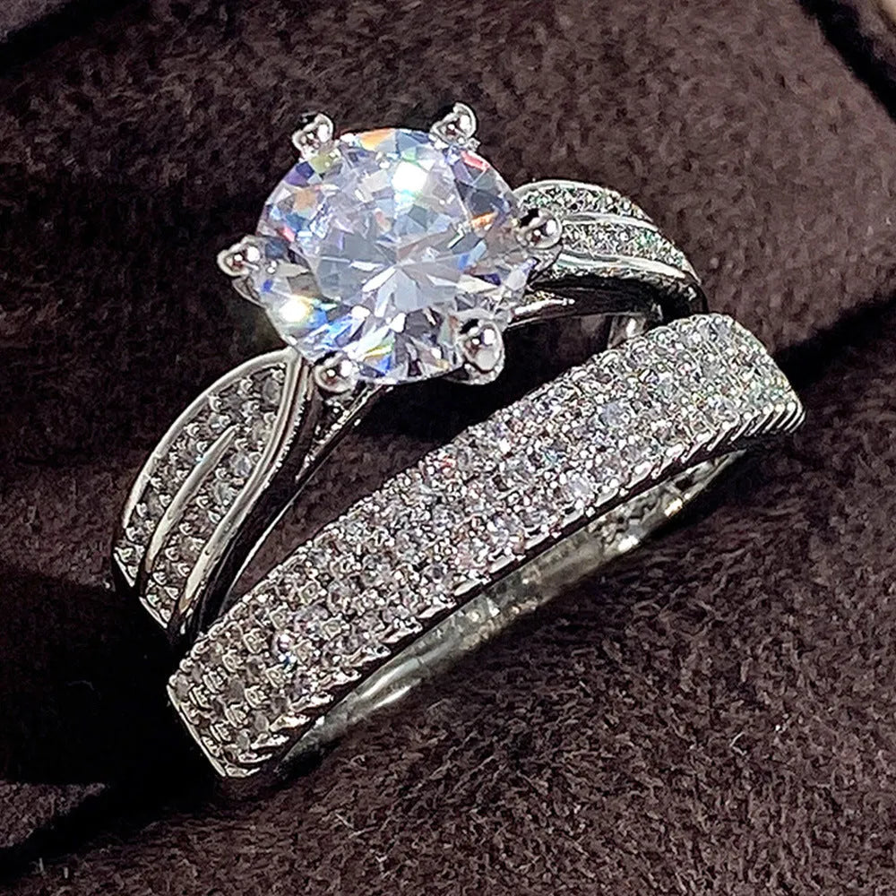 White gold-coloured geometric wedding ring bracelet showing round design elements