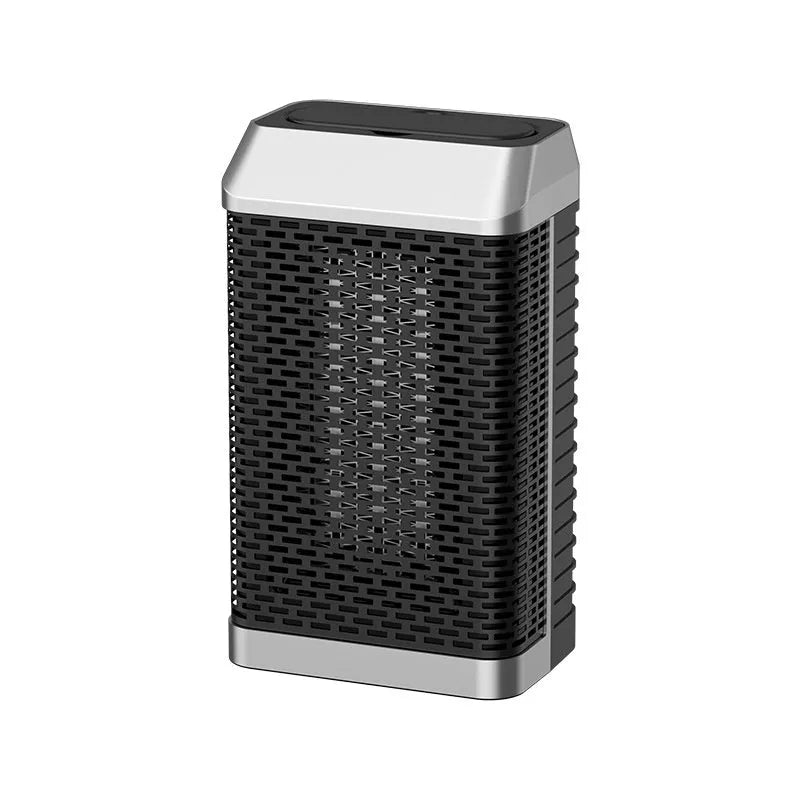 Black remote control desktop heater with digital display and control knobs, shown on a wooden desk.