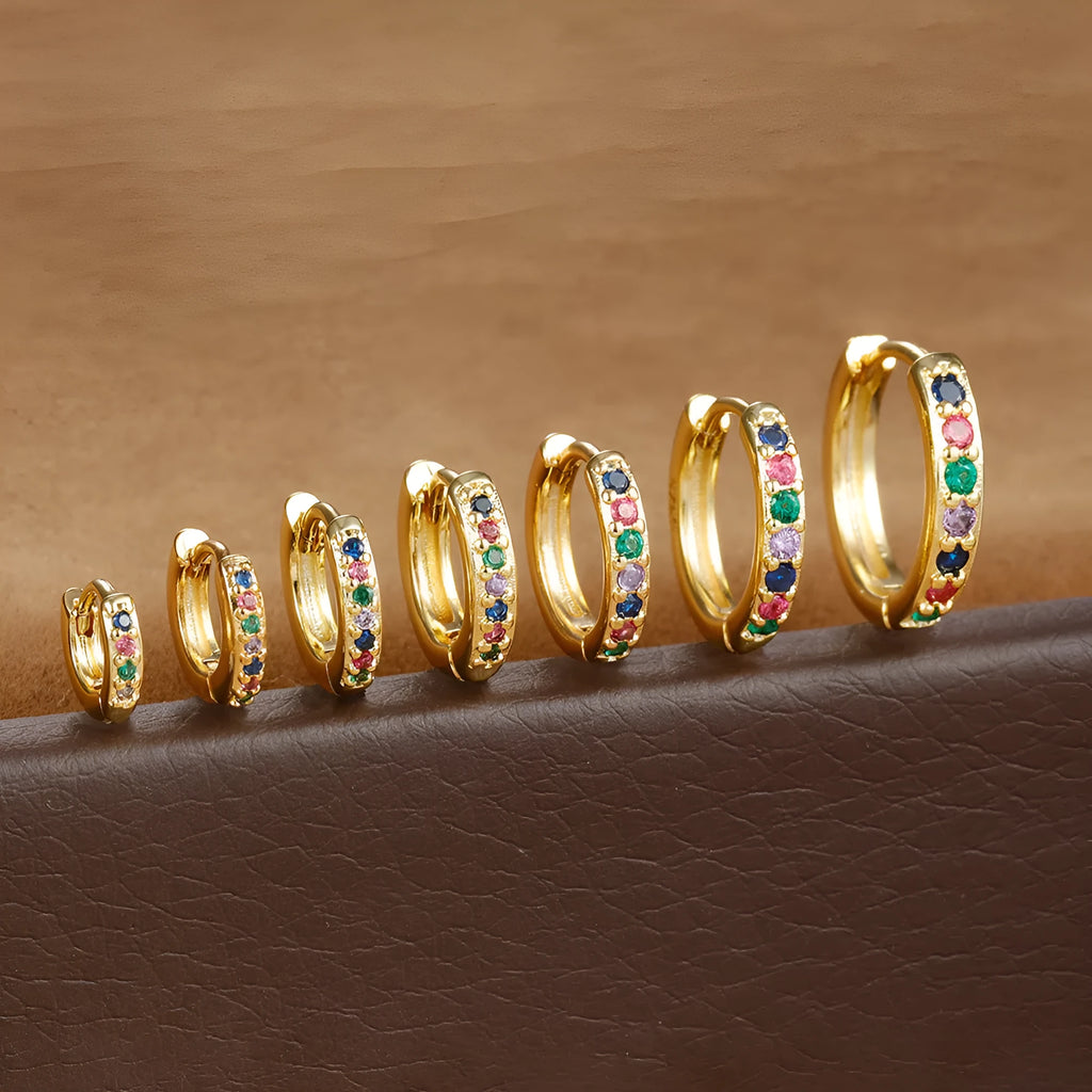 Circle zircon stud earrings in gold, rose gold and silver colours with geometric design