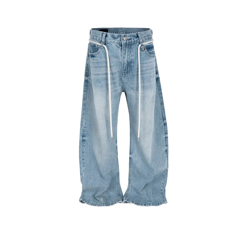 Blue retro washed straight-leg denim trousers with drawstring belt and zipper fly on a model