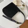 Women's black PU leather shoulder bag with swing thread design and adjustable strap