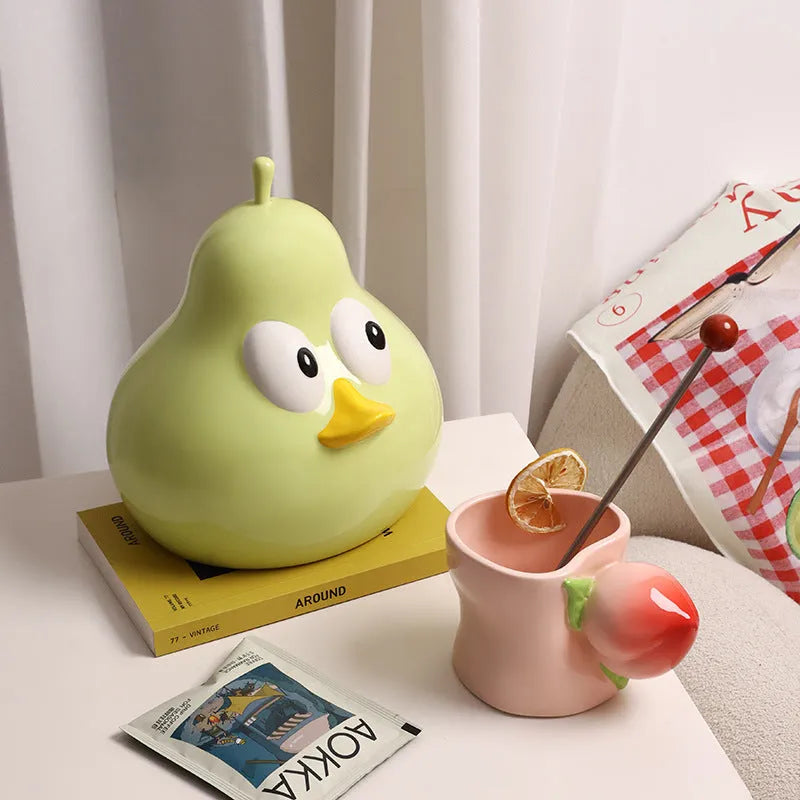 Ceramic pear-shaped tissue box with cute animal design in green colour option