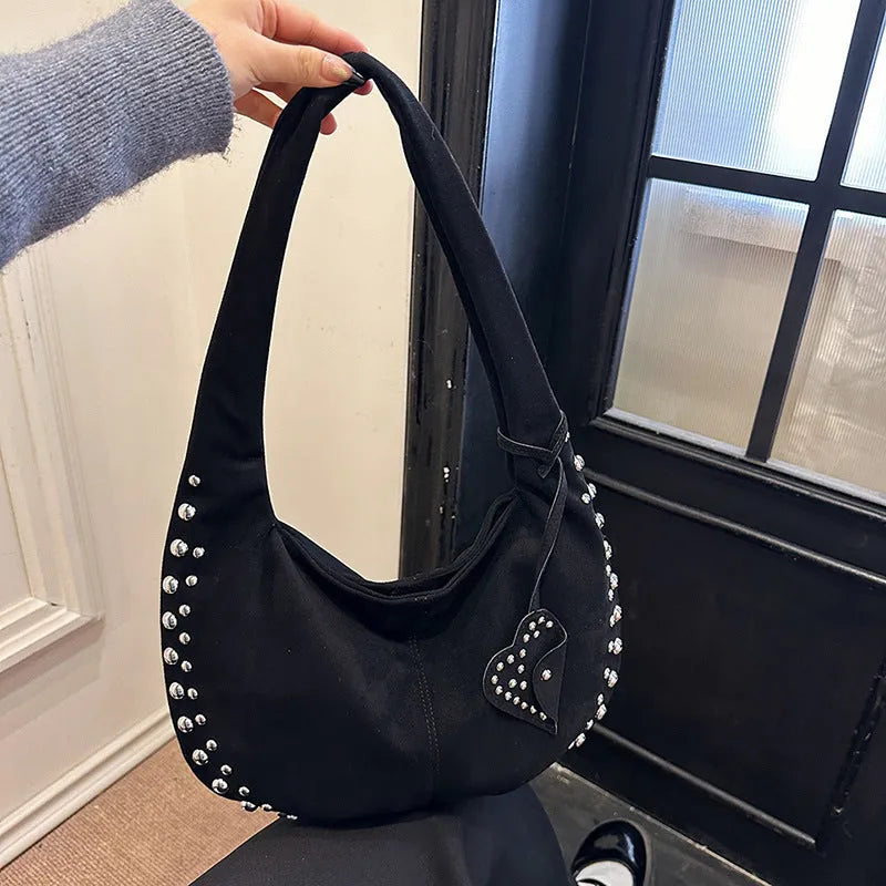 Soft plush underarm tote handbag for women in a strapless retro design, shown in multiple colour options.