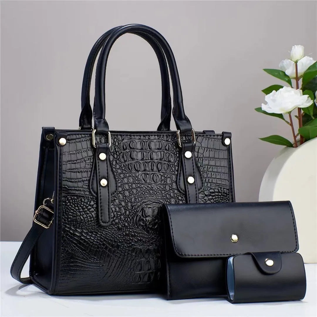 Minimalist PU leather three-piece set showing crossbody bag, wallet, and card holder in a coordinated colour.