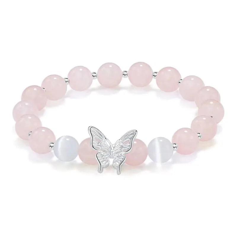Cat eye crystal bracelet for women, bow shape, pink crystal option, on white background