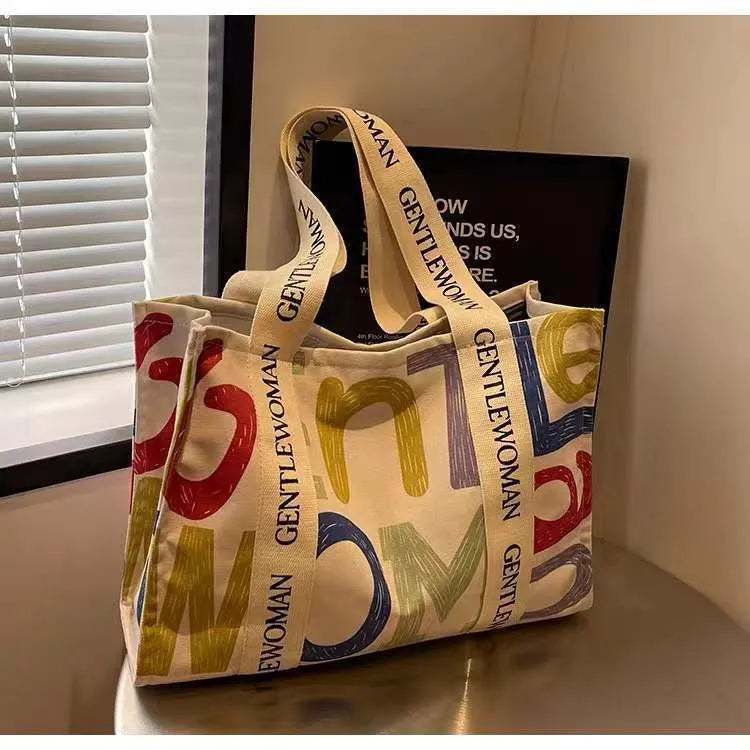 Canvas women's travel tote bag with large capacity and printed design options