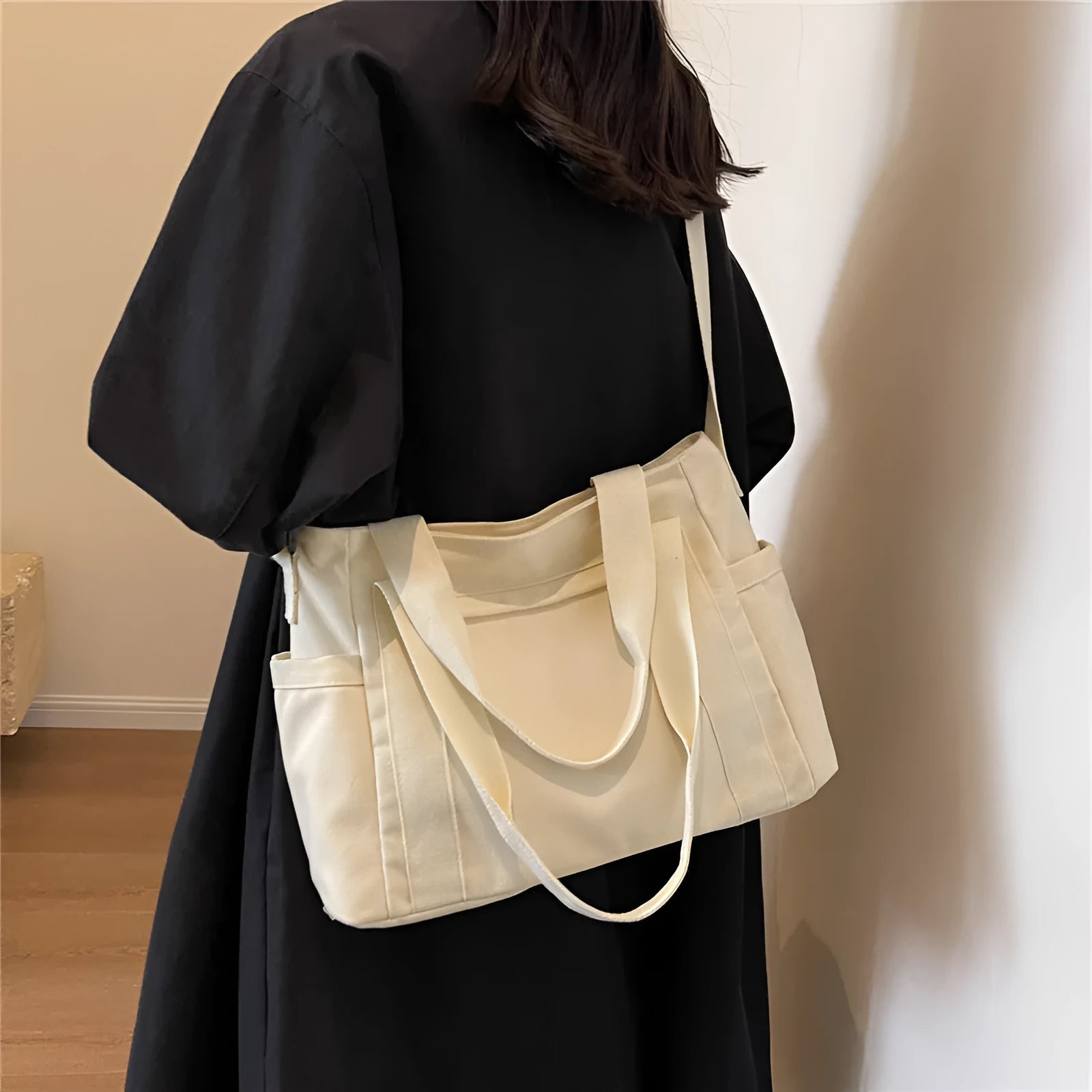 Large capacity shoulder canvas tote bag in solid colour with external sandwich pocket