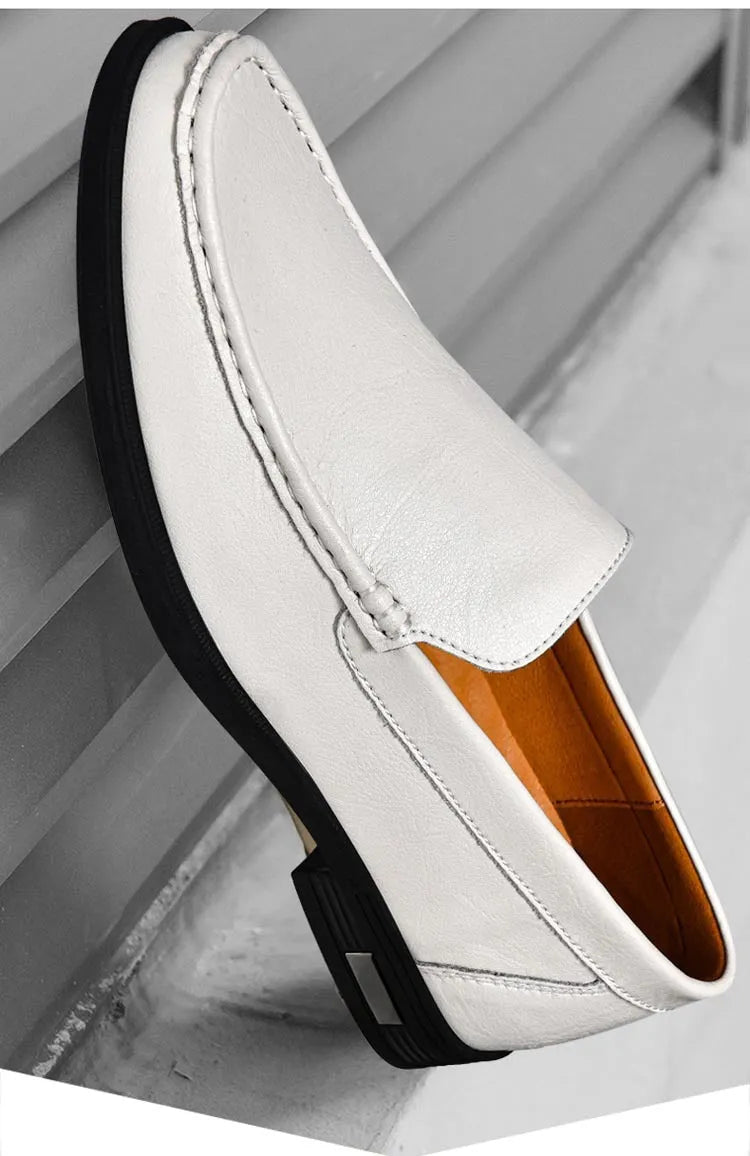 Breathable brown leather casual shoes for men with round toe, car-stitching detail, and leather covers