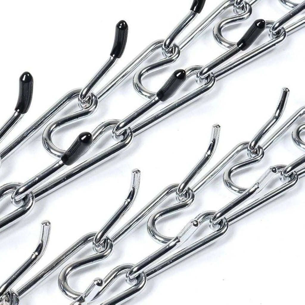 Stainless steel adjustable dog prong training collar with rubber comfort tips on a link.