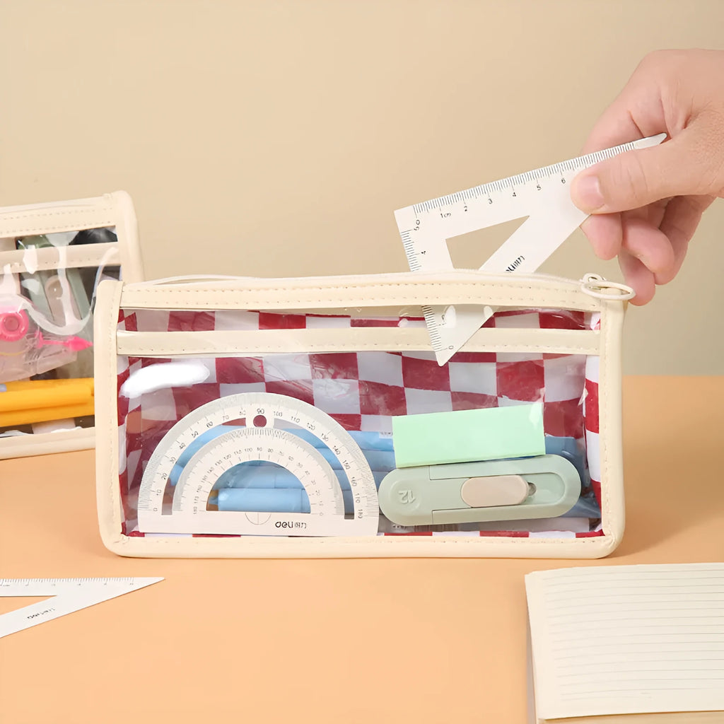 Transparent PVC pencil case with chessboard pattern showing writing instruments inside