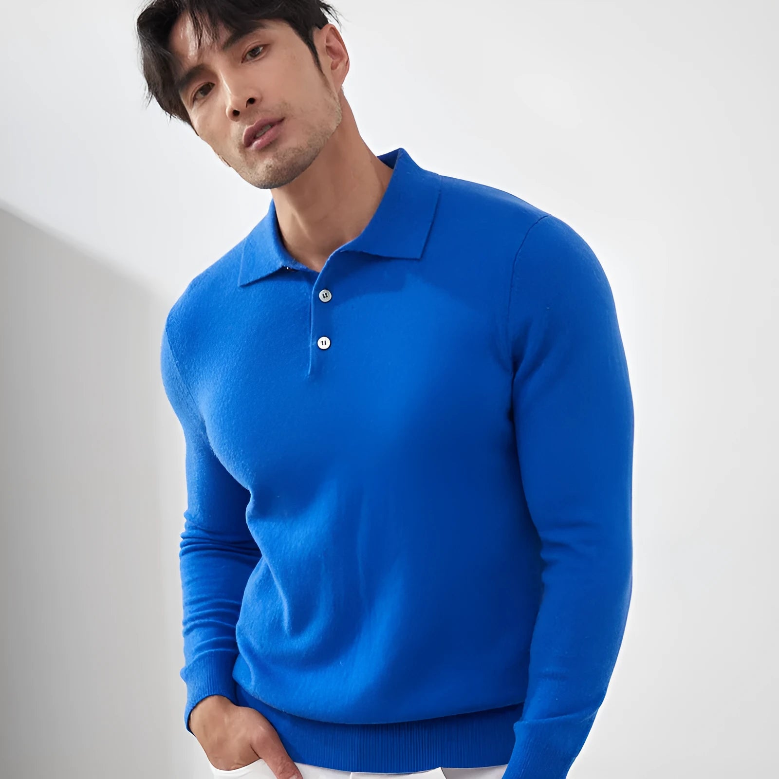 Men's cashmere polo collar pullover sweater in sapphire blue colour showing short sleeves and loose fit