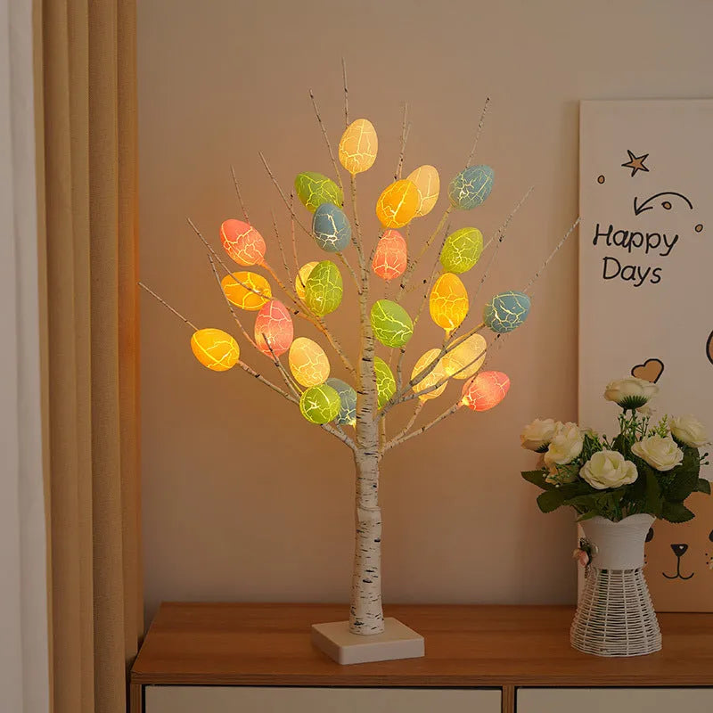 60cm LED birch tree with warm white lights and cracked egg ornaments on a tabletop