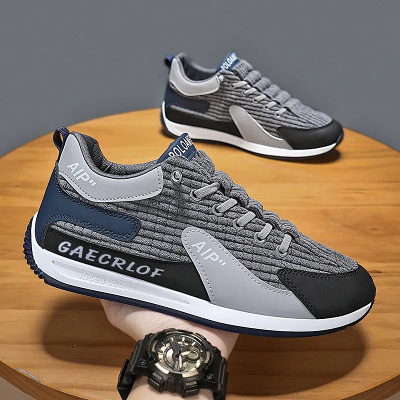 Men's grey mesh running shoes with lace-up design and round toe