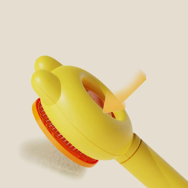 Green self-cleaning pet brush with metal comb and release button on a non-slip handle.