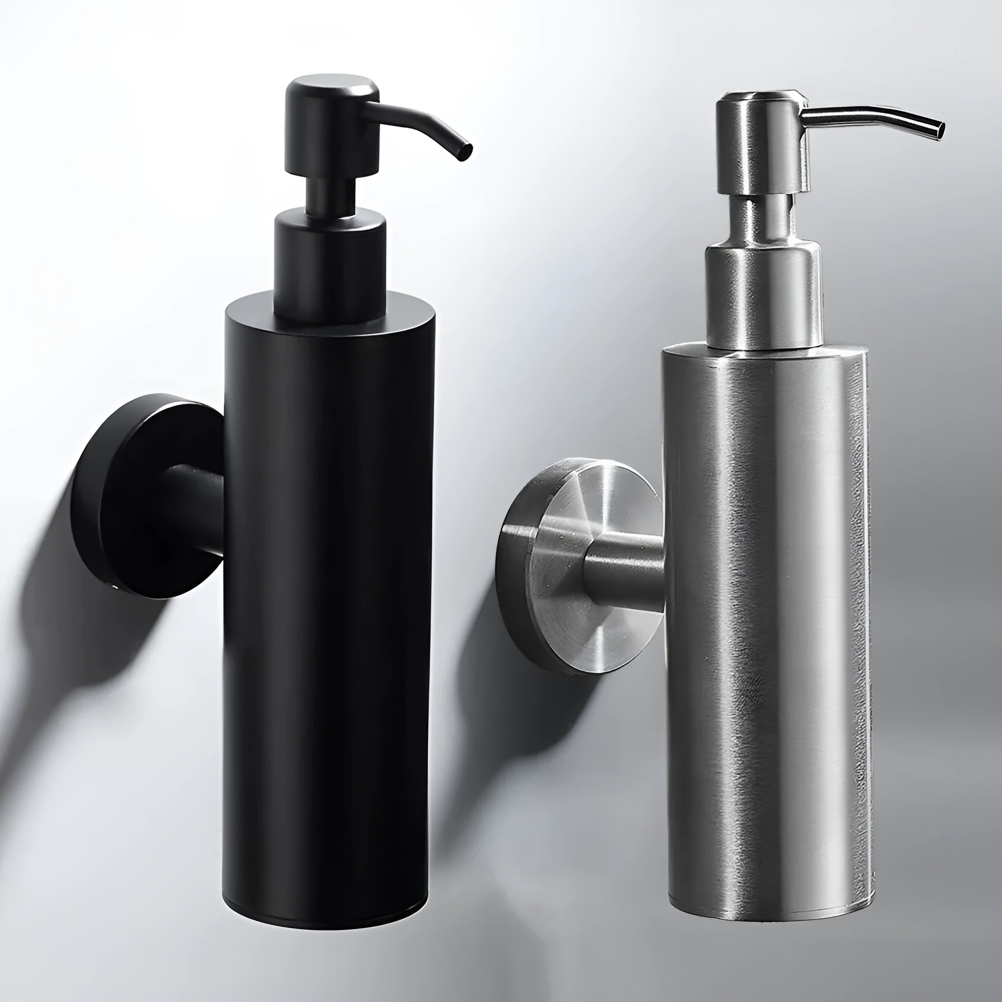 Wall-mounted 304 stainless steel pendant lotion bottle in brushed finish on a bathroom wall
