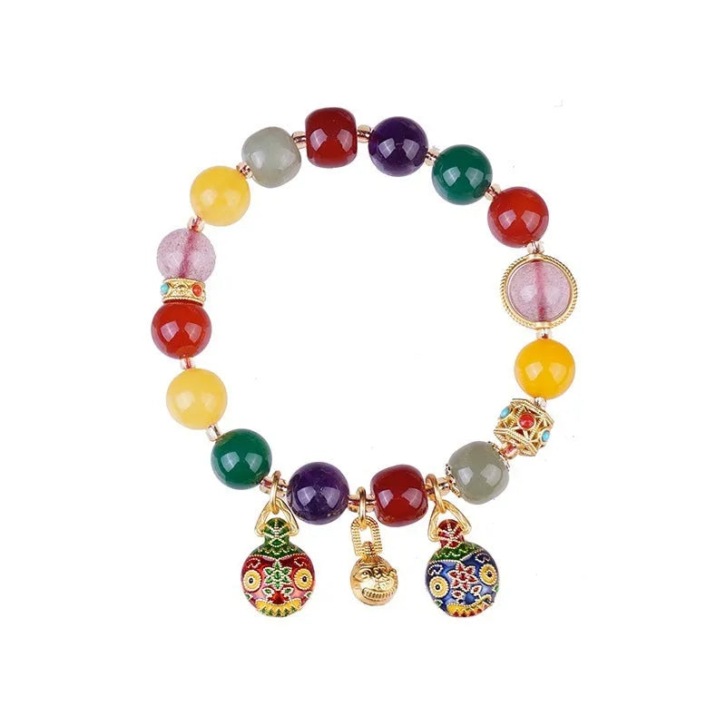 Swallowing Gold Beast agate crystal bracelet with 10mm beads, hand-woven, animal zodiac style on neutral background