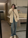 Korean slim fit suit jacket in polyester fabric with long sleeves and pocket details