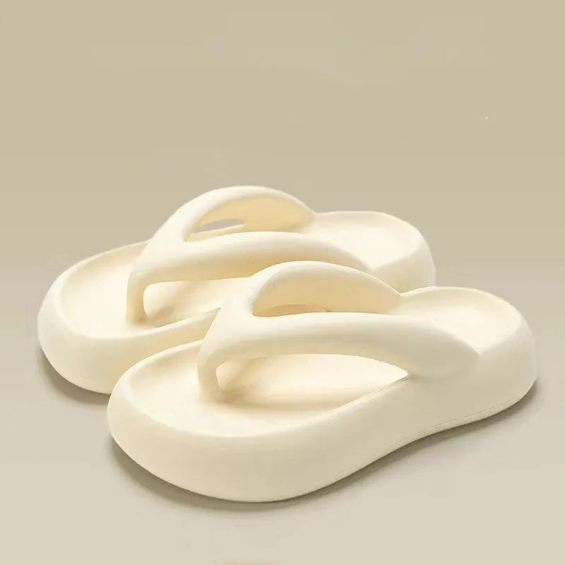 Solid colour thick-soled flip-flops with fashion bow detail on EVA upper