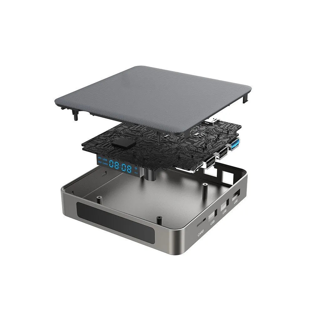 Square black Android TV set-top box with HDMI port and remote control on a wooden surface