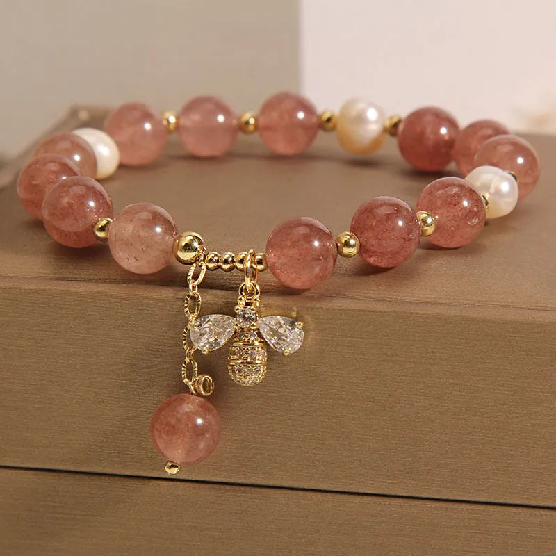 Women's freshwater pearl and strawberry quartz bracelet with zircon accents and adjustable closure