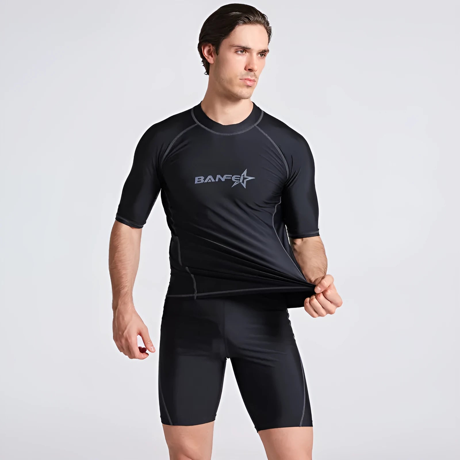 Men's quick-dry nylon swimsuit top and pants set for surfing and snorkelling.