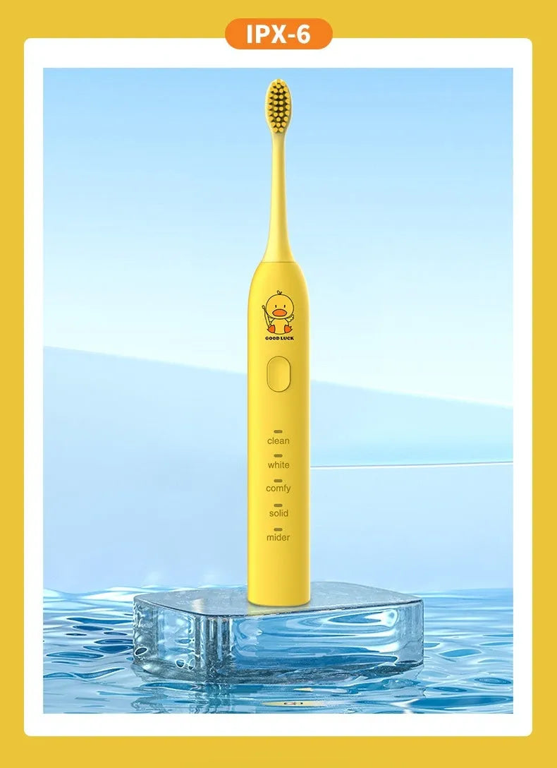 Yellow USB rechargeable electric toothbrush with small duck laser engraving and soft bristle head