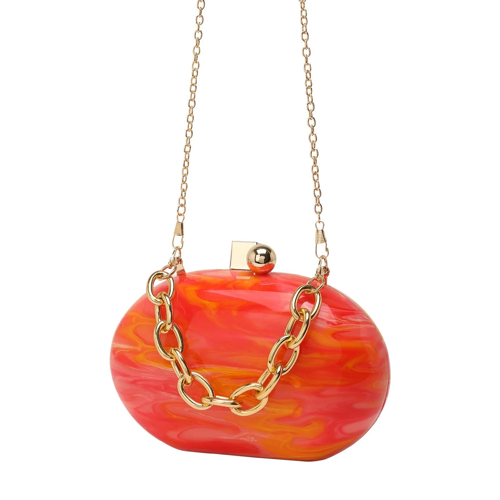 Oval acrylic chain crossbody handbag in pearlescent white with hard shell and three-dimensional pocket