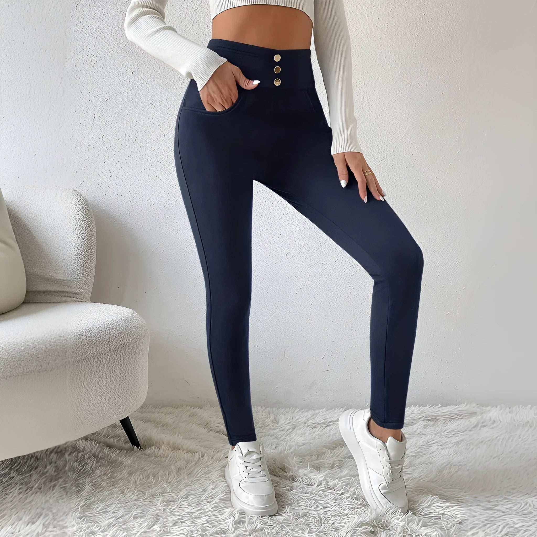 Navy blue women's high waist casual trousers with straight leg fit on hanger