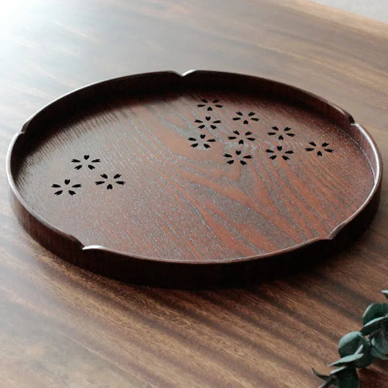 Wooden shallow plate with cherry blossom cut-out design, 30cm diameter.