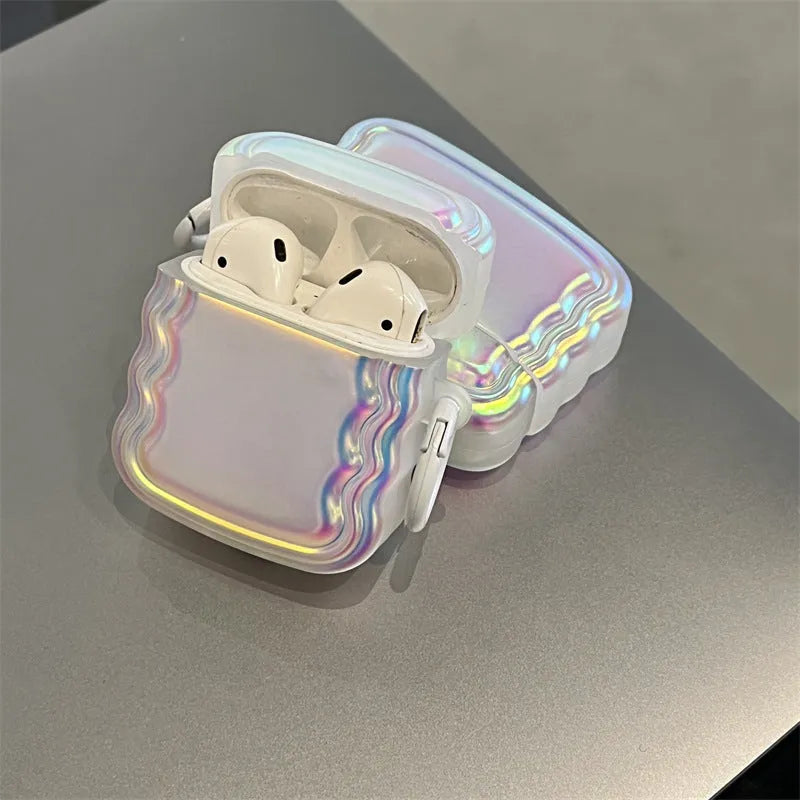 Silicone AirPods case with holographic laser ring design on a white charging case.
