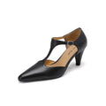 Brown retro women's T-strap sandals with a buckle, closed toe, and a short stout heel.