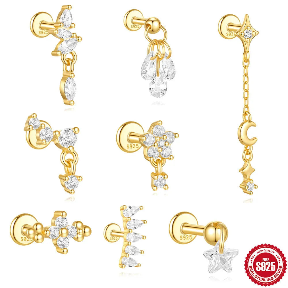 S925 sterling silver geometric moon and star earrings with diamond accents in a gold colour.