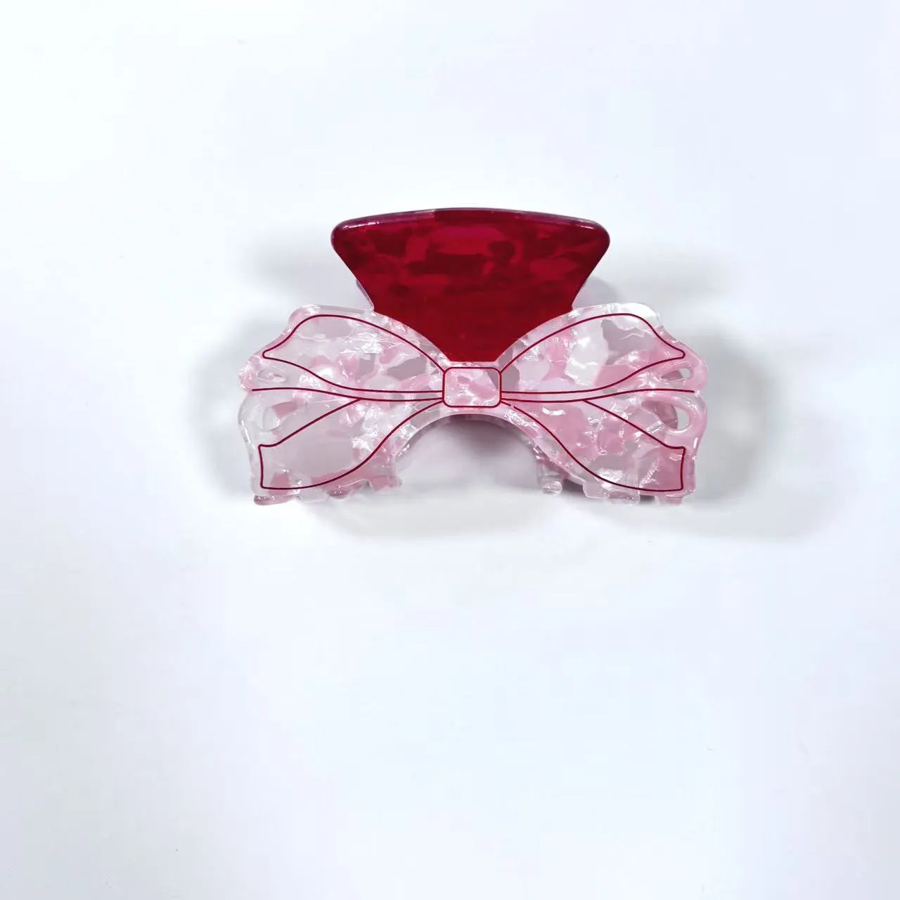 Acrylic bow tie hair grip in cream with glitter oil injection finish, 8cm long, for women